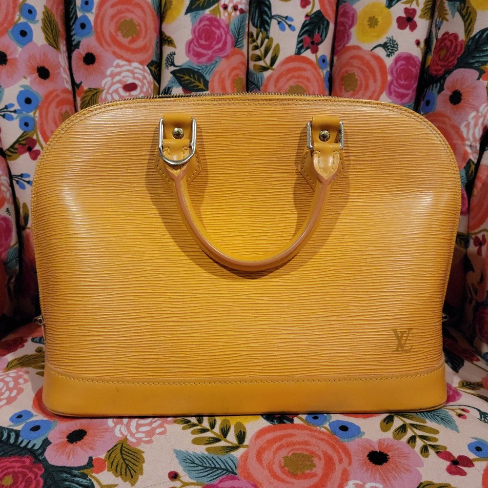 Tassil yellow epi leather alma pm, royal purple interior